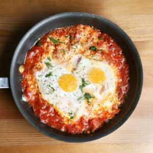 Shakshuka with Cheese, Tuna and Tomatoes