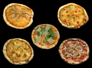 Deliciously Cheesy Mini Pizzas With Anchovies And Artichoke Hearts